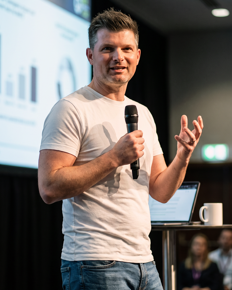 Stuart McLeod, founder of McLeod Media, speaking at a conference
